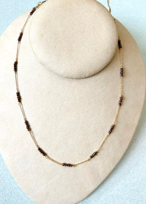 #639 brown seed pearls 16” chain necklace